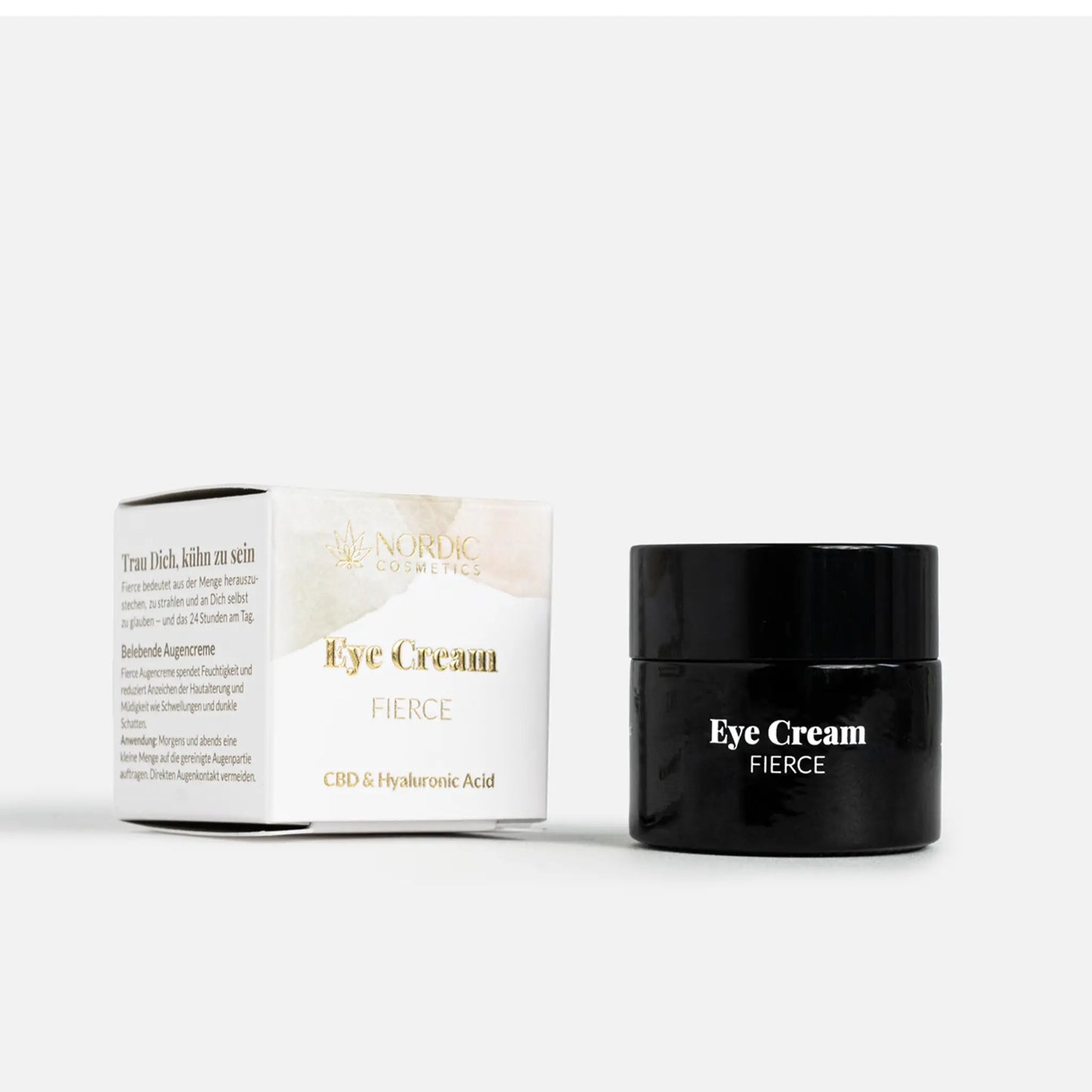 Crème pour les yeux Fierce de Nordic Cosmetics, emballage blanc et pot noir