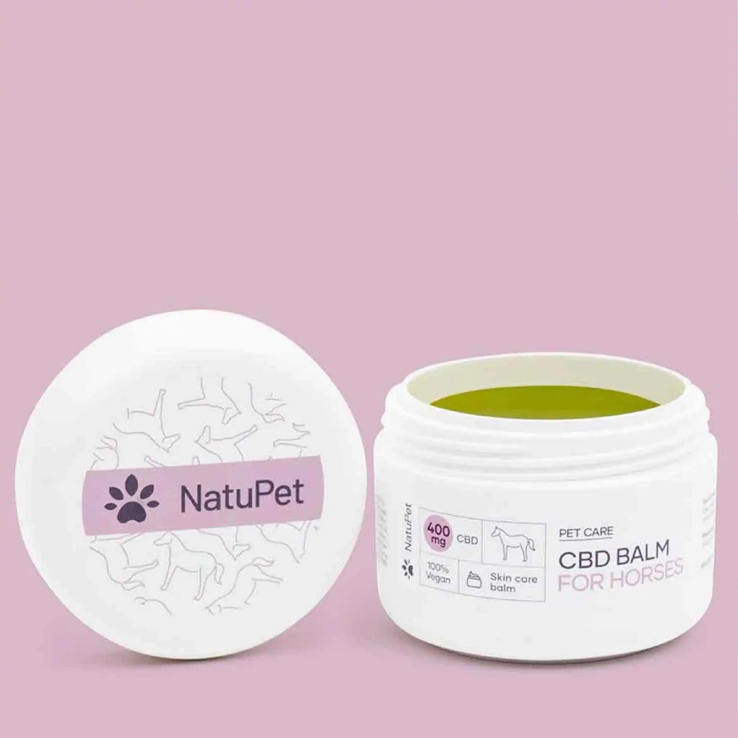 un baume CBD ouvert se tient devant un fond rose