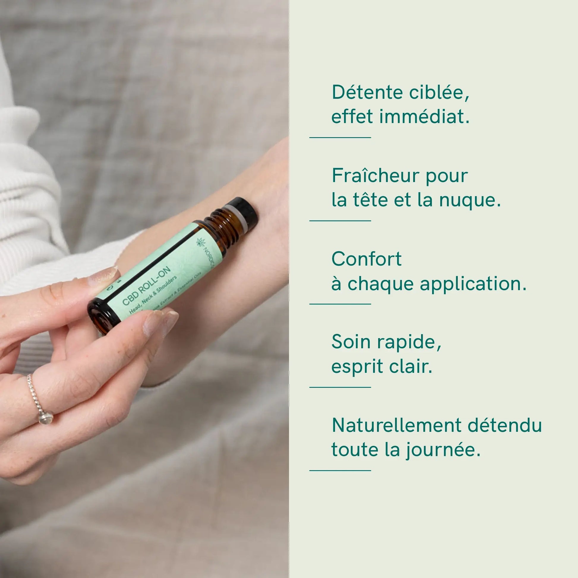Flacon roll-on CBD en verre brun tenu par une main près de l’avant-bras, prêt à être appliqué sur la peau.