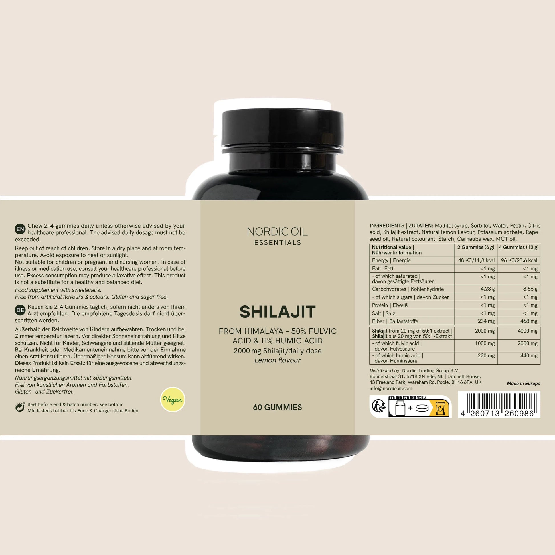 Bouteille noire de gommes Shilajit Nordic Oil Essentials sur fond beige.